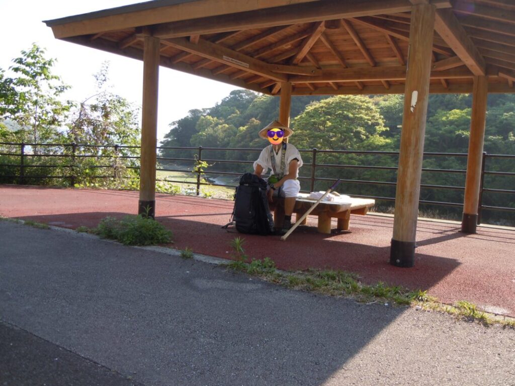 Resting at a pavilion after taking off my backpack