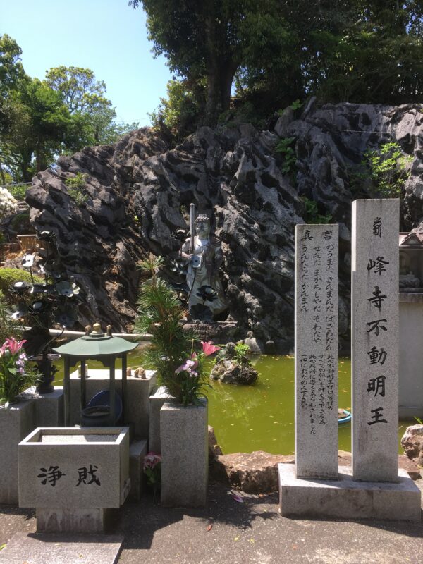 Rock formations and statue of Fudō Myōō at Zenjibuji