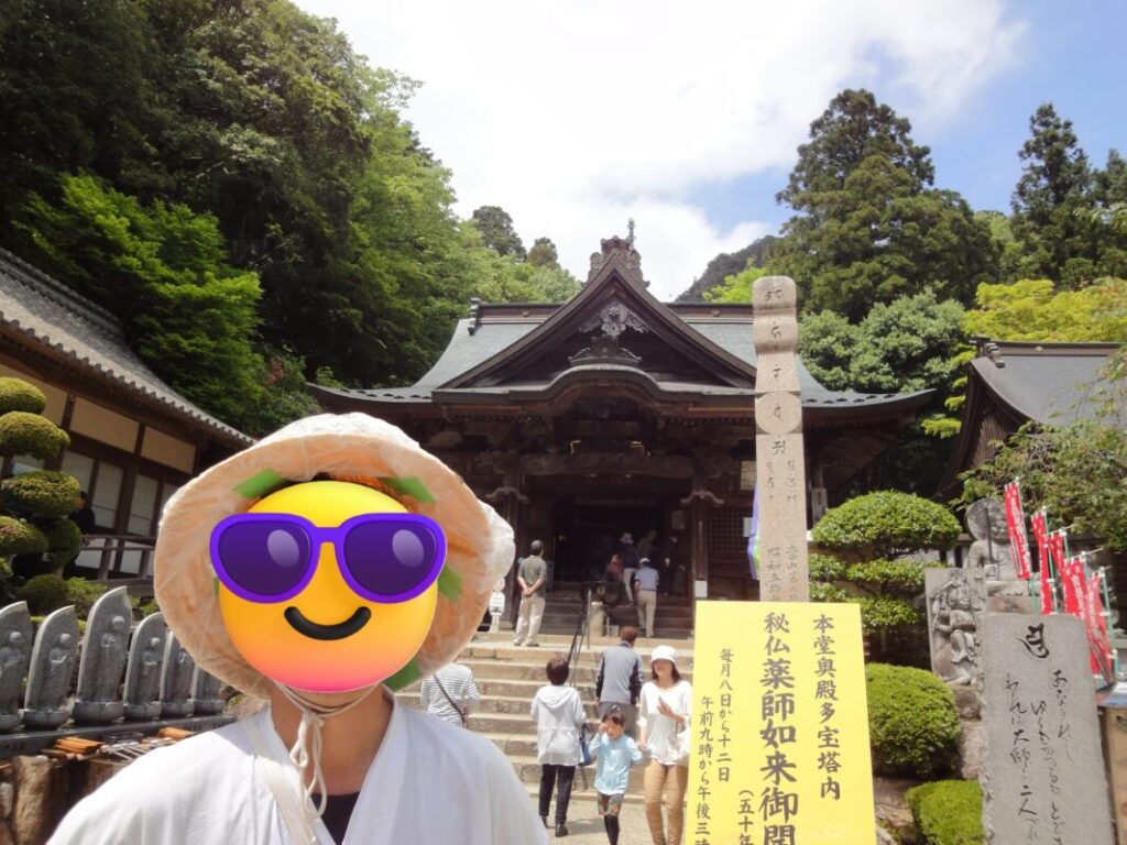 Me after completing the Shikoku Pilgrimage on foot, celebrating with a commemorative photo at Okuboji Temple.